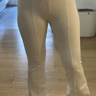 ZARA - cream-coloured flared trousers / unworn