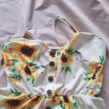 kneelength yellow and white sundress