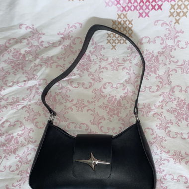 Black shoulder bag with silver star detail