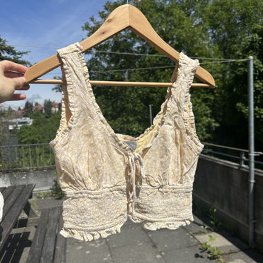 Yellow floral corset-style cropped top