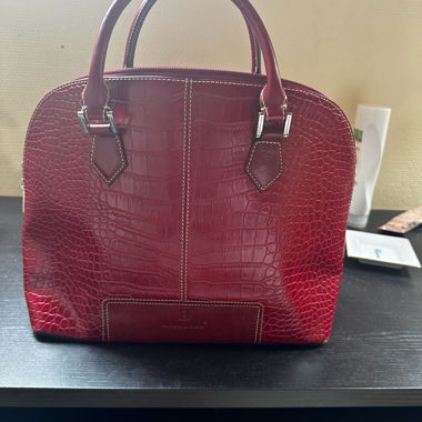 Red handbag with crocodile effect