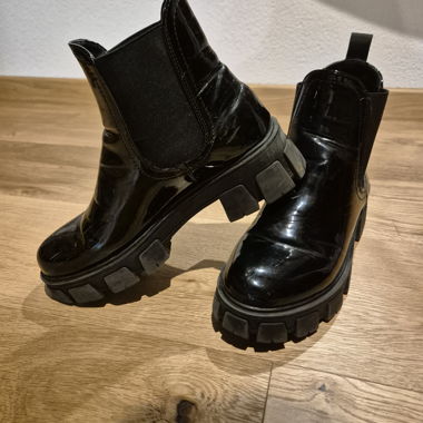 Black patent ankle boots