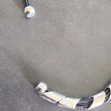 Black necklace with silver-toned elements