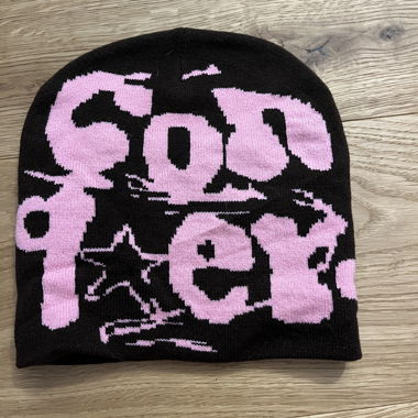 Brown beanie with pink lettering