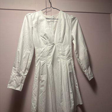 White long-sleeve dress with V-neck