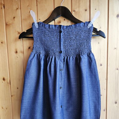 Top a fascia con bottone e tessuto denim