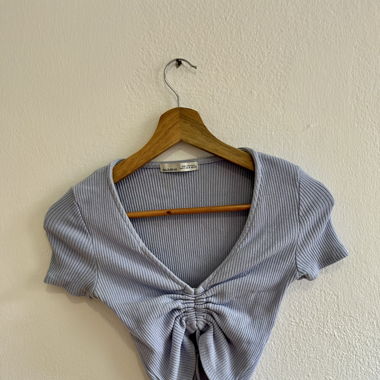Light-blue crop top
