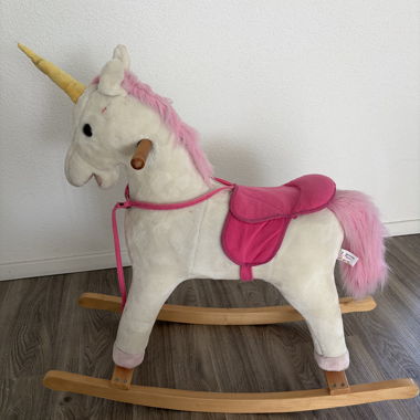 Cheval à bascule avec selle