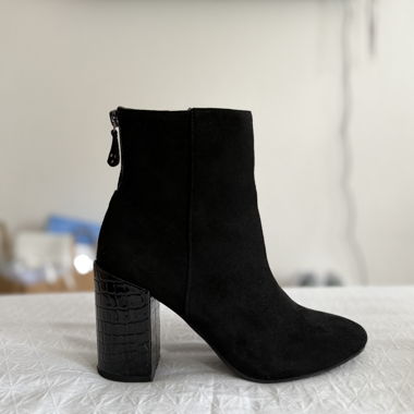 Bottes avec effet crocodile sur le talon