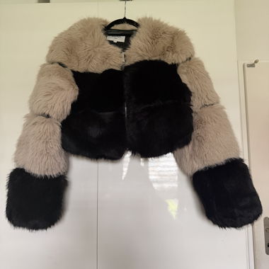 Veste fausse fourrure bicolore