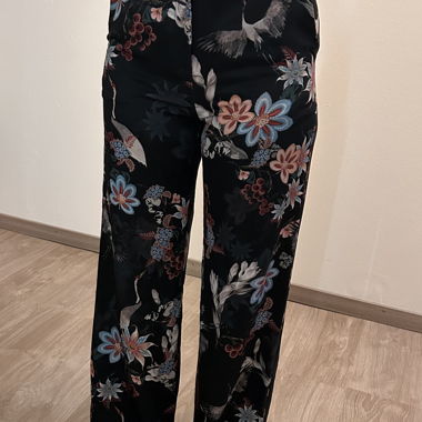 Pantalon large noir à motif fleuri