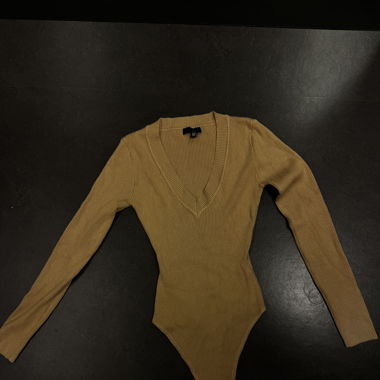 beige bodysuit never worn