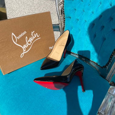 Christian Louboutin black and red high heels 
