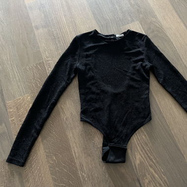 12 Storeez Body Top with an Open Back