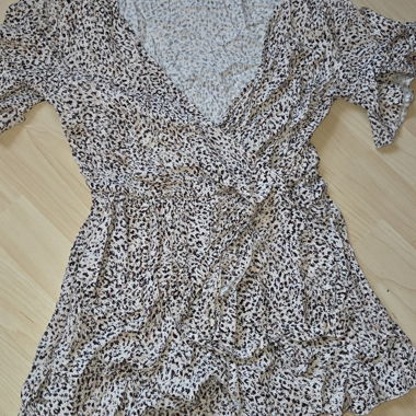 Tuta con stampa leopardata