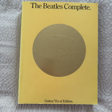 Beatles collector book guitar