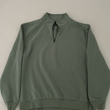 Green quarter-zip sweater