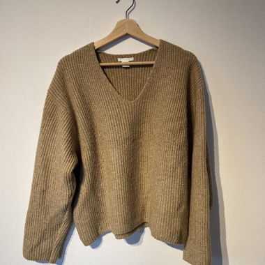 Beige ribbed V-neck sweater