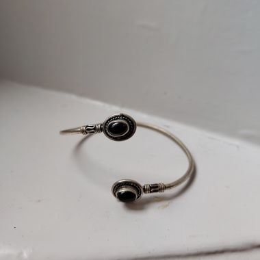 silver cuff with black stones