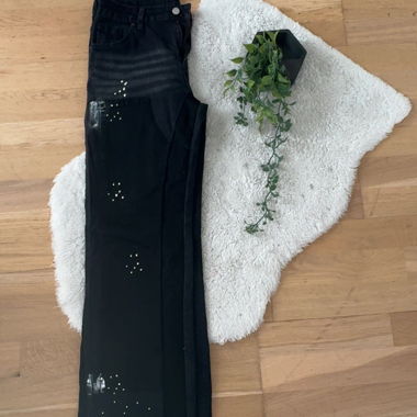Jeans flare noir tache de peinture 