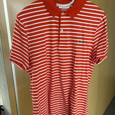 Polo Lacoste a righe rosso e bianco