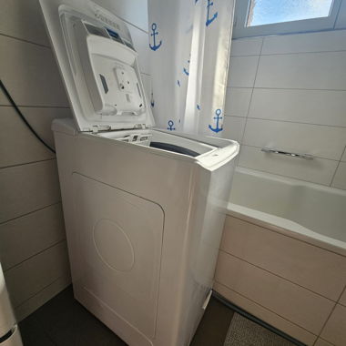 Lave-linge à chargement par le dessus Candy