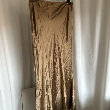 Long gold satin skirt