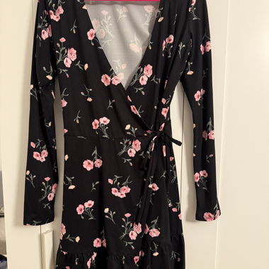 Black floral dress with wrap and ruffles