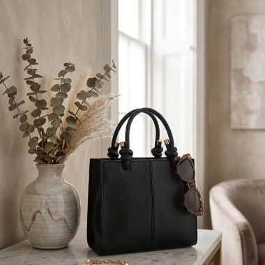 Schwarze Handtasche mit gold