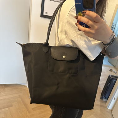 All black Longchamp Le Pliage M