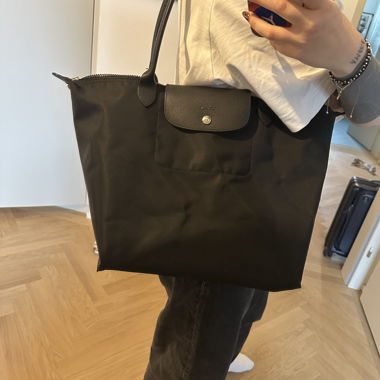 All black Longchamp Le Pliage M