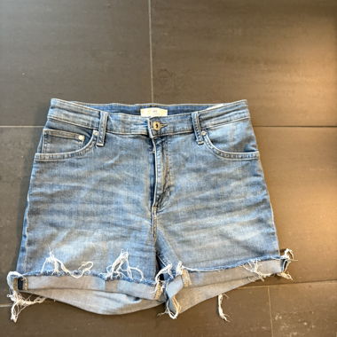 Light blue denim shorts, frayed