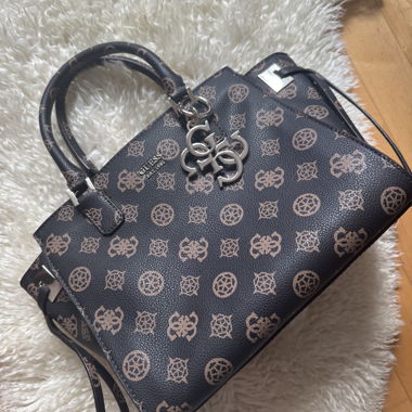 Guess handbag with adjustable and removable shoulder strap