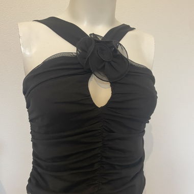 Party top with a flower detail 