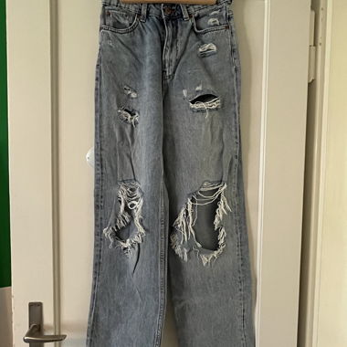 Jeans zerrissen/mit Löcher
