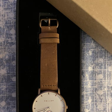 Watch Meller like new with its package 