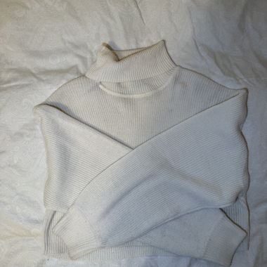 Maglione dolcevita color crema