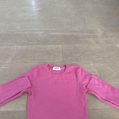 Langes pinkes bauchfreies Shirt 