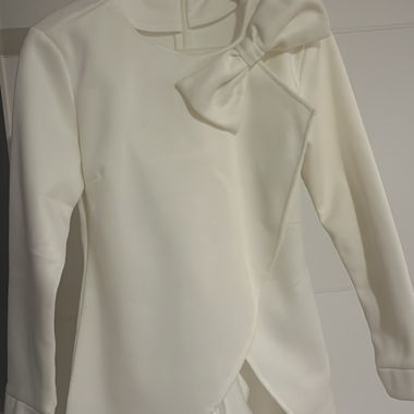 Maglione con fiocco