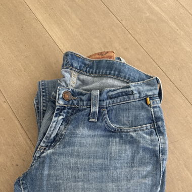 Lange blaue Jeanshose 