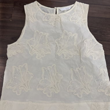Top en dentelle sans manches