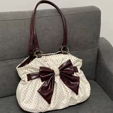 Sac à main à pois avec grand nœud