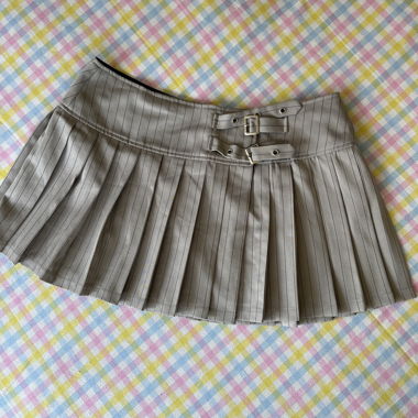 Tennis mini skirt with wrap front and belt details