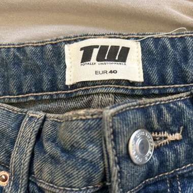 Jeans déchirés