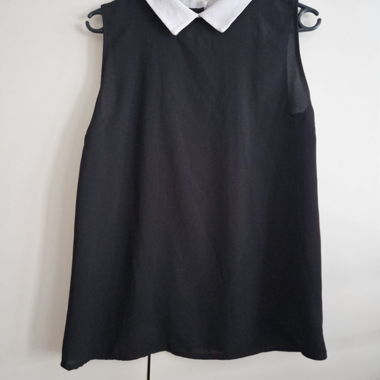 Camicia nera senza maniche