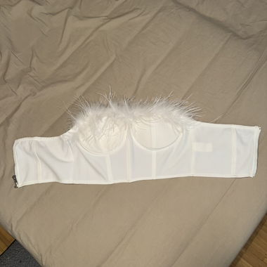 Bustier blanc à plumes