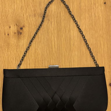 Black clutch with chain strap