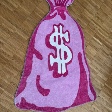 Teppich mit rosa Dollarzeichen