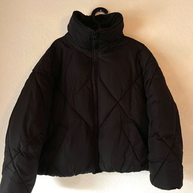 Schwarze Puffer Jacke