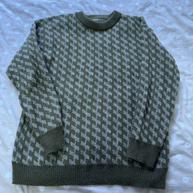 Green patterned knit sweater